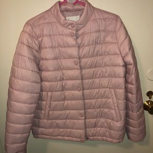 Pink puffer jacket.